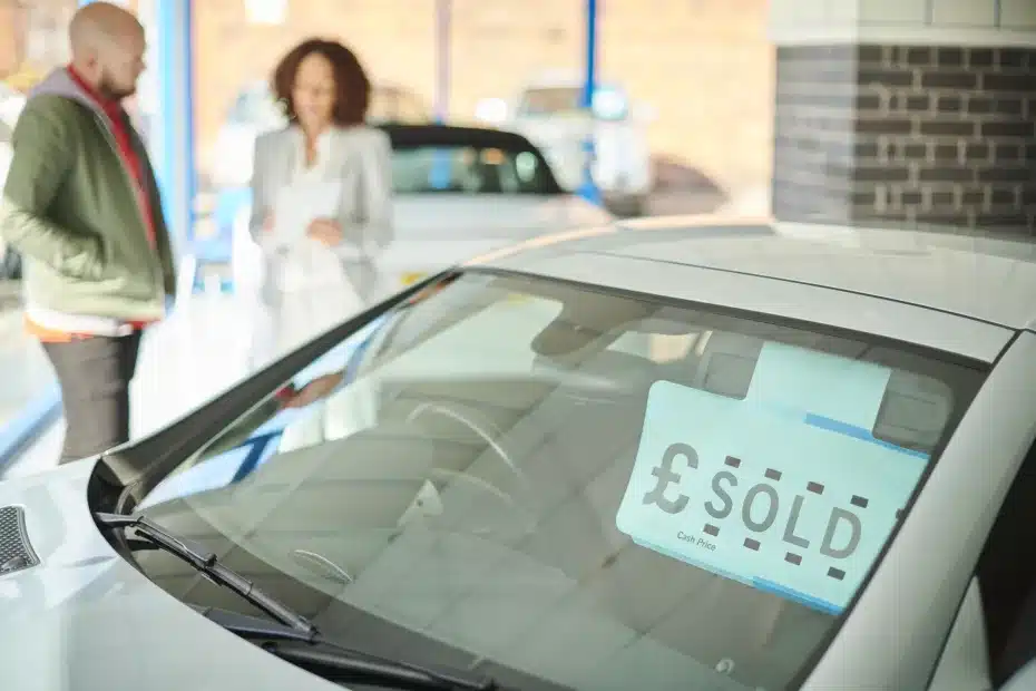 sold car in dealership showroom
